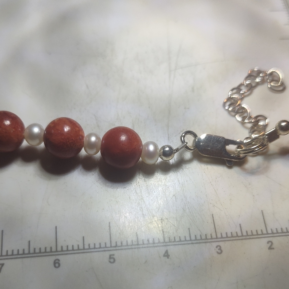 Elegant Red and White Beaded Bracelet